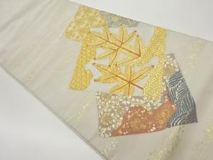 色紙に若松・草花・笹蔓緞子模様織出し袋帯